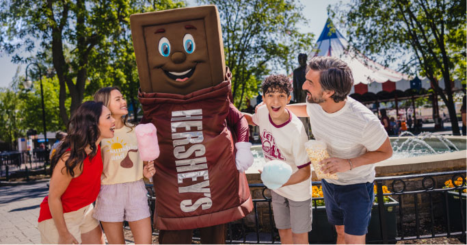 Friends posing with Hershey Bar