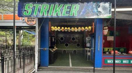 Kick soccer balls at targets and win a prize
