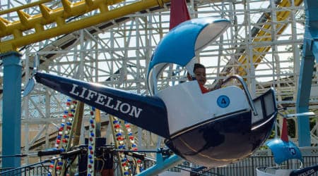Child riding the Helicopters at Hersheypark