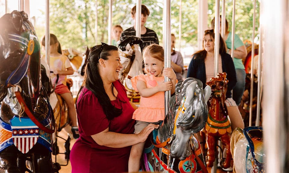 mom with child on carousel at hersheypark