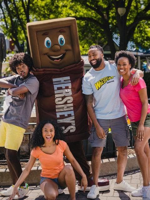 family-posing-with-hershey-bar-character.jpg