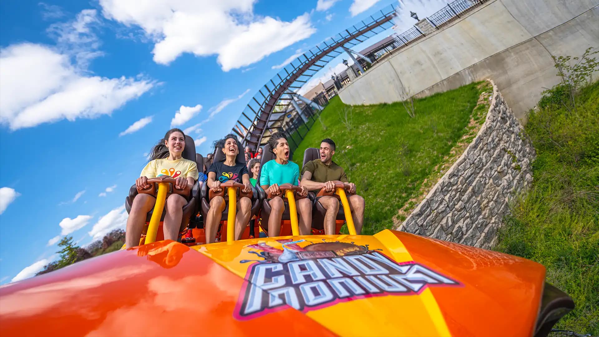 family riding candymonium at hersheypark