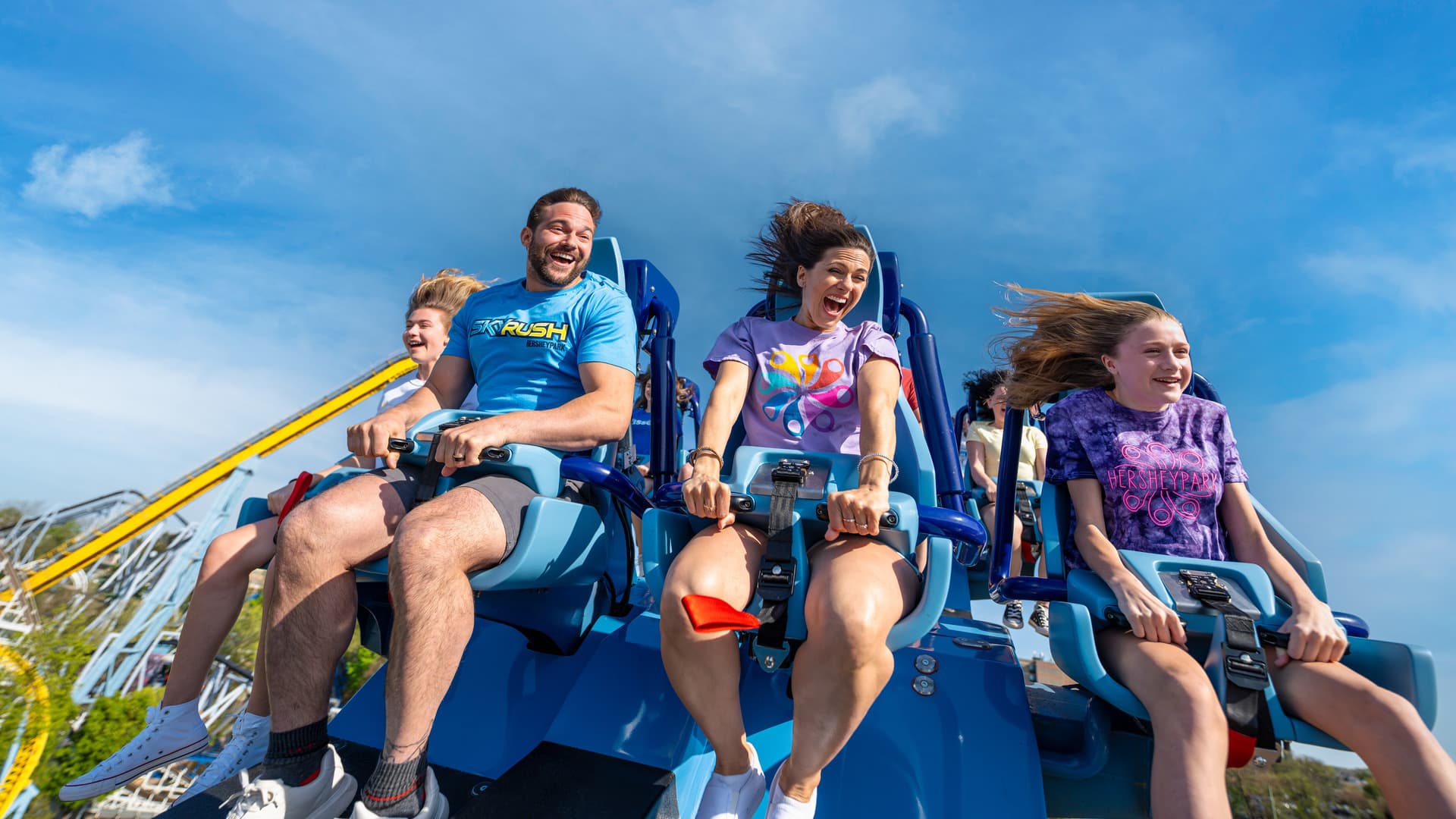family-going-down-the-hill-on-skyrush-roller-coaster.jpg