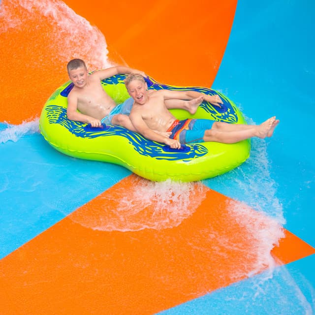 two-boys-riding-coastline-plunge-water-slide.jpg