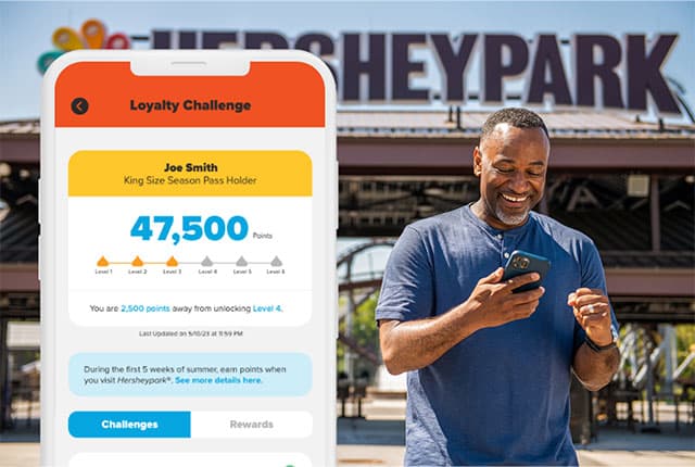 man looking at loyalty challenge points total in app