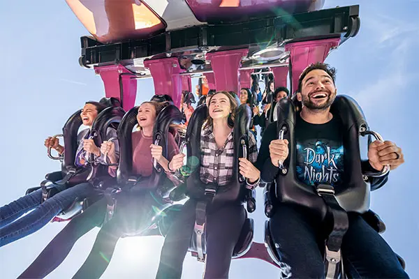 riders on great bear during hersheypark halloween