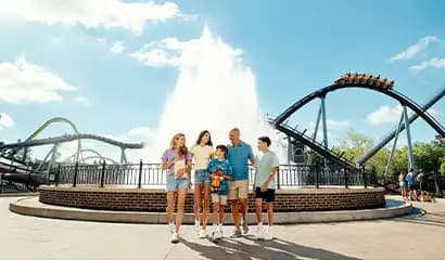 family at kissing fountain at hersheypark