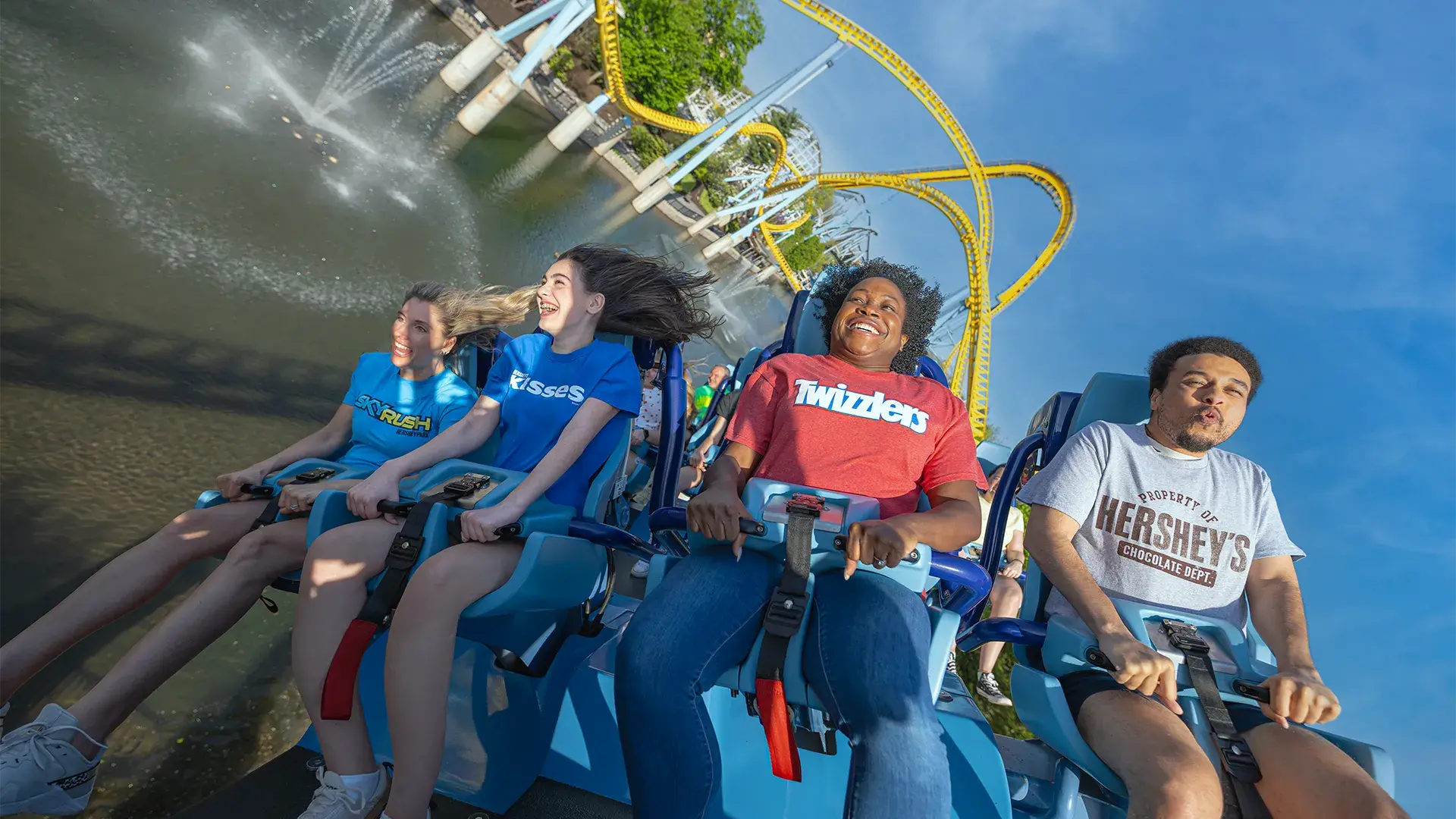 family riding skyrush at hersheypark over water photo