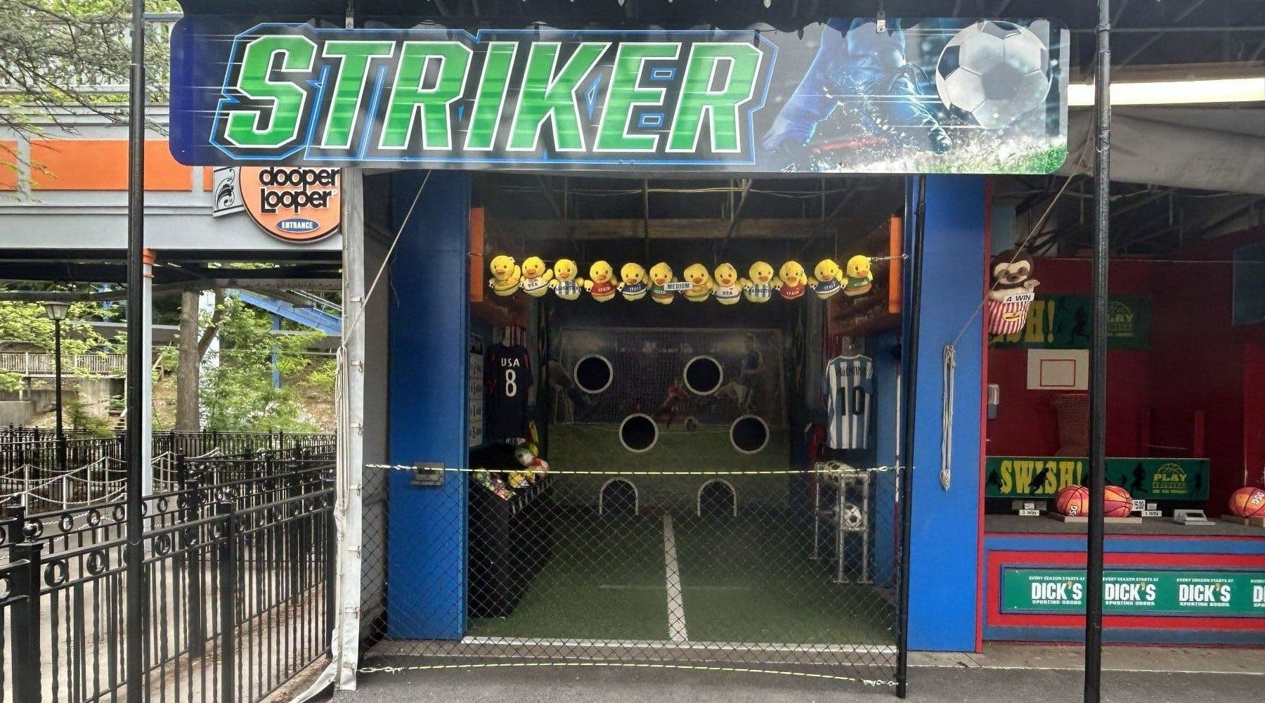 Kick soccer balls at targets and win a prize