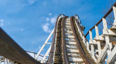 People riding The Comet Wooden Rollercoaster