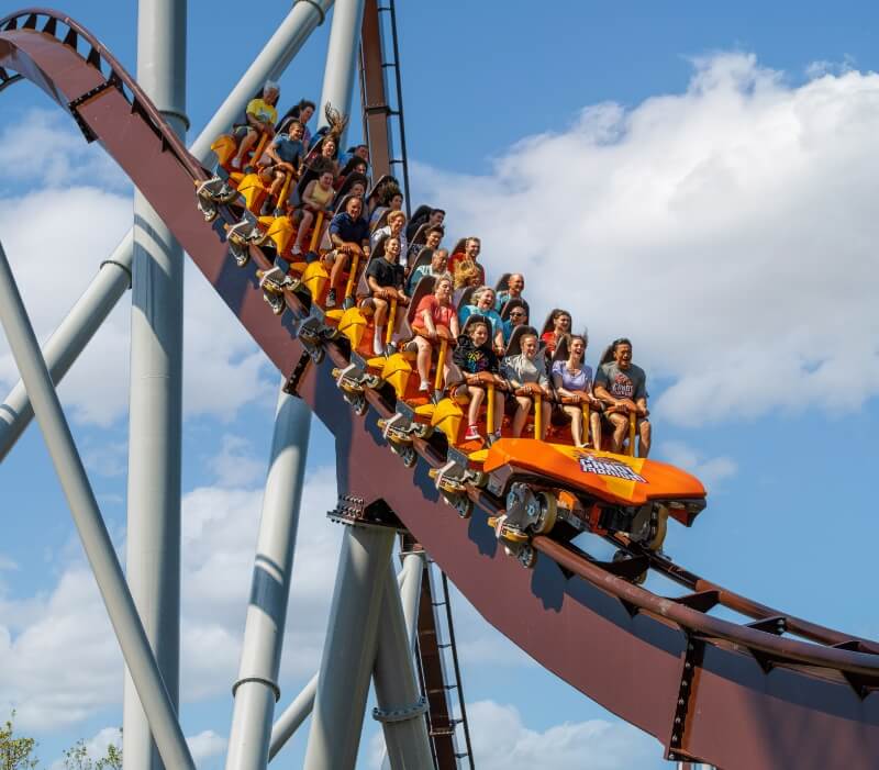 People riding Candymonium Roller Coaster