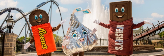 Hershey characters in front of Kisses fountain at Hersheypark